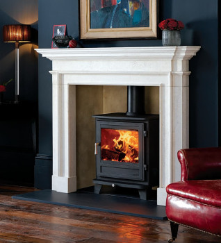 The Salisbury 8WS MK3 wood burning stove shown with The Burlington fire surround in limestone in a classically themed living room