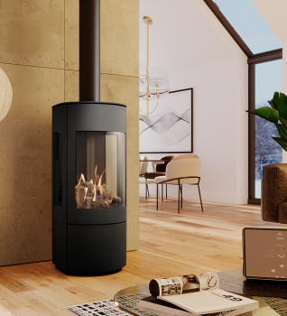 Dru Convexo Balanced Flue Gas Stove in a modern living room with a vaulted ceiling